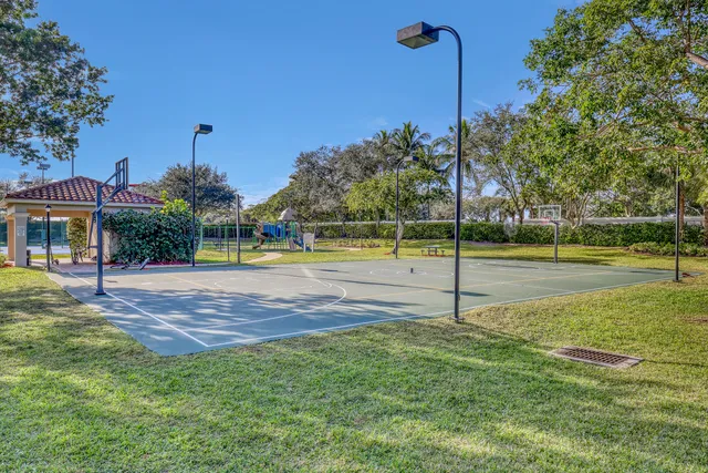 an aerial view of houses with yard