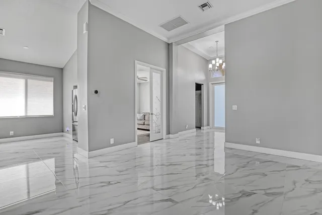 a kitchen with a sink cabinets and window