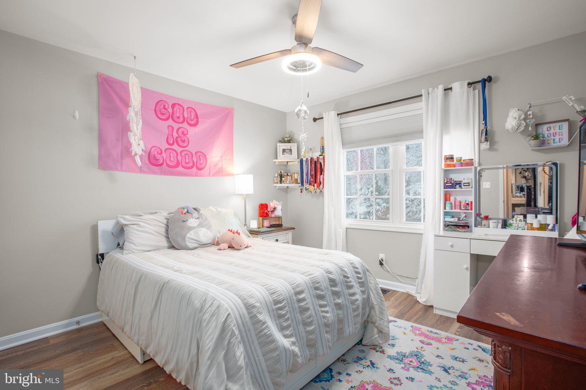 114 Saylers Creek Road Locust Grove, VA 22508 - Photo 22 of 32 a bedroom with a bed and a desk