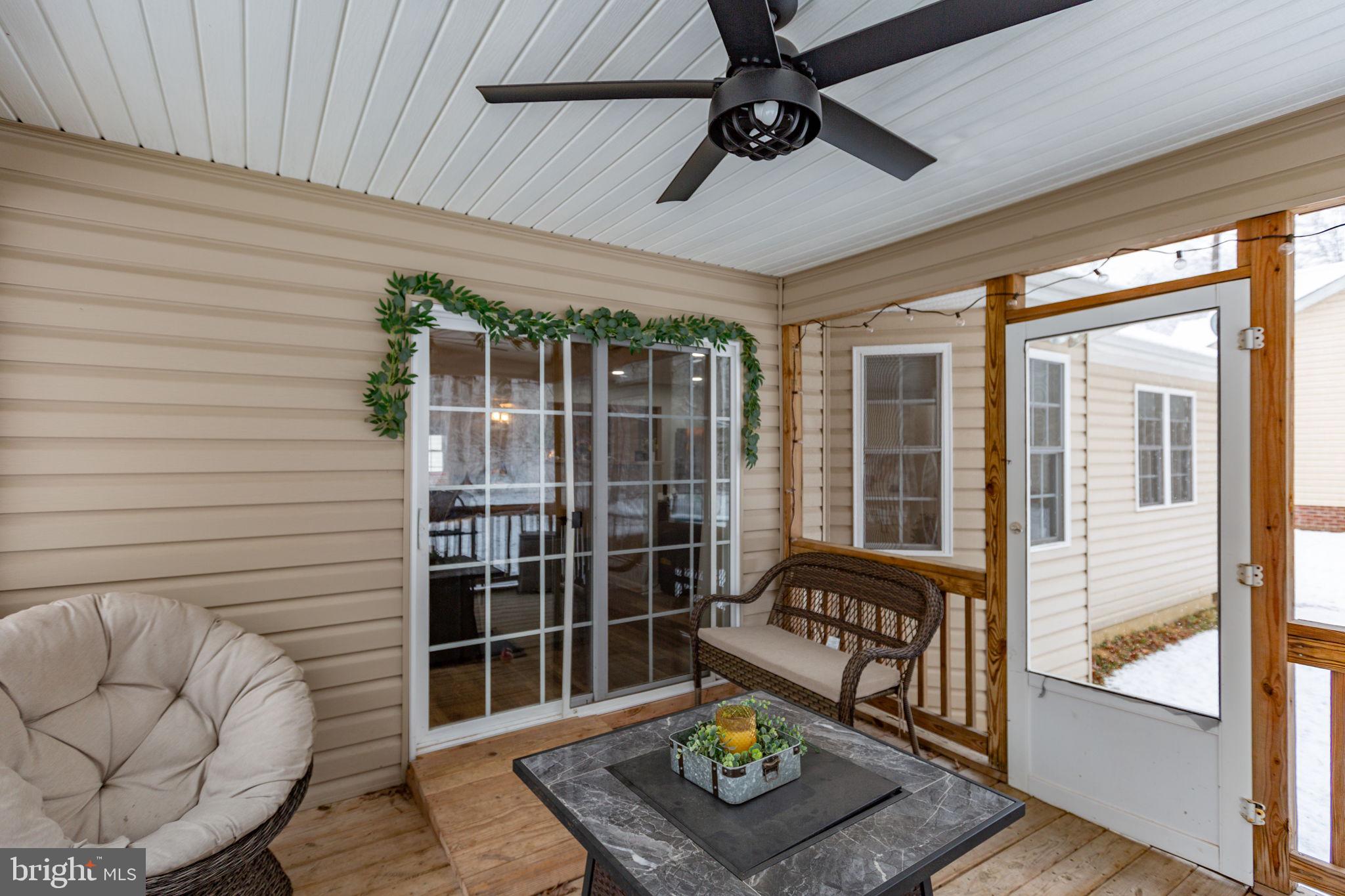 114 Saylers Creek Road Locust Grove, VA 22508 - Photo 29 of 32 a view of sitting area with furniture and floor to ceiling window