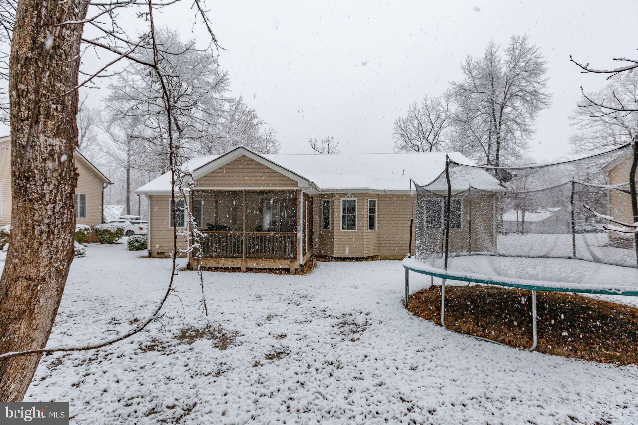 114 Saylers Creek Road Locust Grove, VA 22508 - Photo 31 of 32 a front view of a house with a yard covered in snow