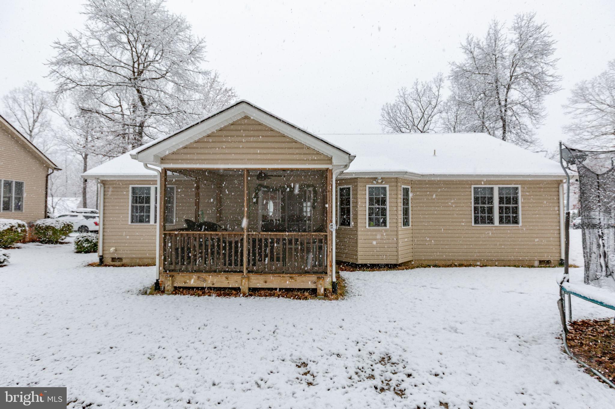 114 Saylers Creek Road Locust Grove, VA 22508 - Photo 32 of 32 a front view of a house with a yard covered in snow