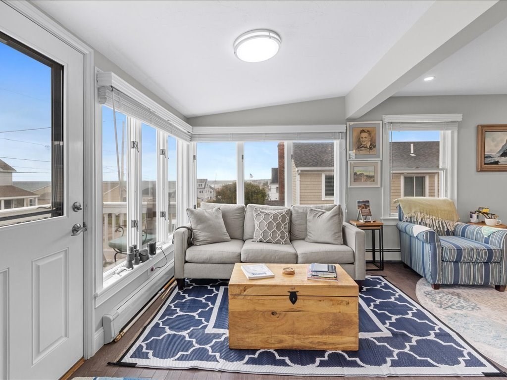 35 Cliff Road South Scituate, MA 02050 - Photo 12 of 42 a living room with furniture and a large window