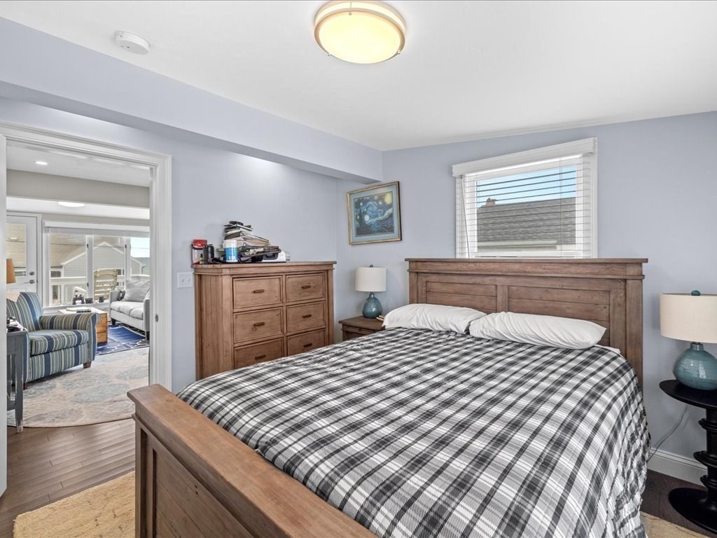 35 Cliff Road South Scituate, MA 02050 - Photo 19 of 42 a bedroom with a bed and a dresser