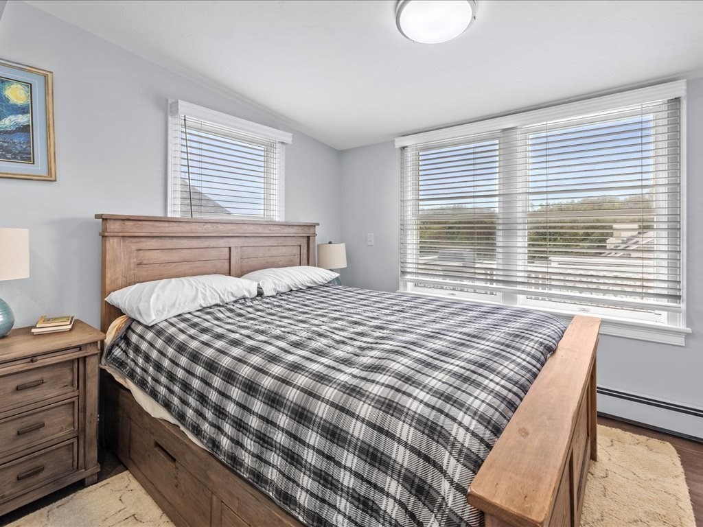 35 Cliff Road South Scituate, MA 02050 - Photo 20 of 42 a bedroom with a bed and a window