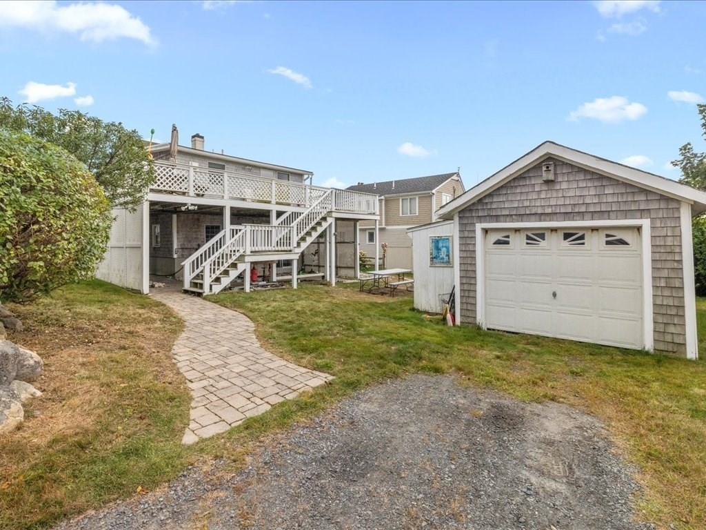 35 Cliff Road South Scituate, MA 02050 - Photo 29 of 42 a front view of a house with a yard