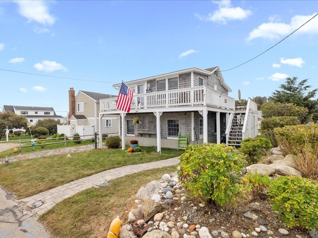35 Cliff Road South Scituate, MA 02050 - Photo 3 of 42 a front view of a house with a yard