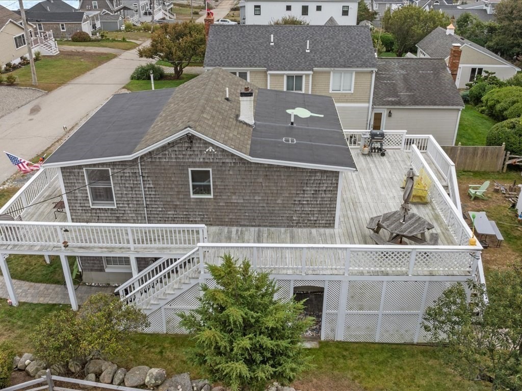 35 Cliff Road South Scituate, MA 02050 - Photo 33 of 42 an aerial view of a house with a garden and plants