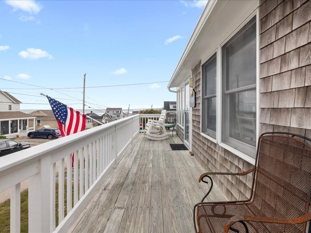 35 Cliff Road South Scituate, MA 02050 - Photo 37 of 42 a roof deck with table and chairs