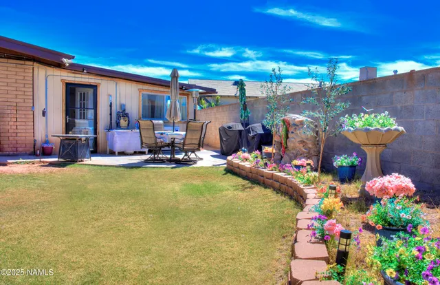 a view of swimming pool with outdoor seating