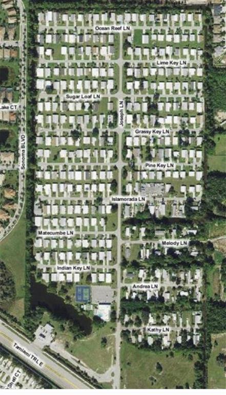 171 Pine Key Lane, Unit 28 Naples, FL 34114 - Photo 8 of 8 a bathroom with a shower