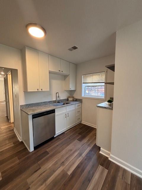 1076 Grant Way Southeast Atlanta, GA 30315 - Photo 11 of 29 a kitchen with granite countertop white cabinets and white appliances