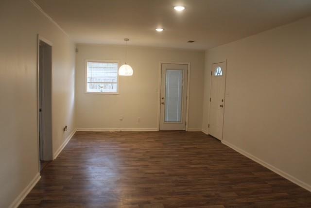 1076 Grant Way Southeast Atlanta, GA 30315 - Photo 13 of 29 an empty room with wooden floor and windows