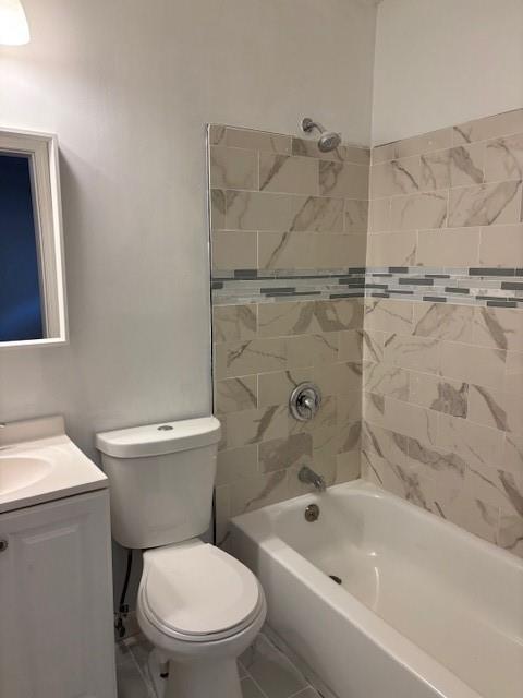 1076 Grant Way Southeast Atlanta, GA 30315 - Photo 21 of 29 a white toilet sitting next to a bath tub and a shower