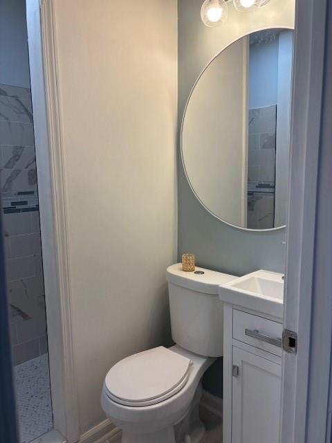 1076 Grant Way Southeast Atlanta, GA 30315 - Photo 27 of 29 a white toilet sitting next to a bathroom sink