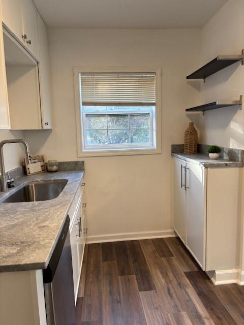 1076 Grant Way Southeast Atlanta, GA 30315 - Photo 9 of 29 a kitchen with a sink stove and cabinets