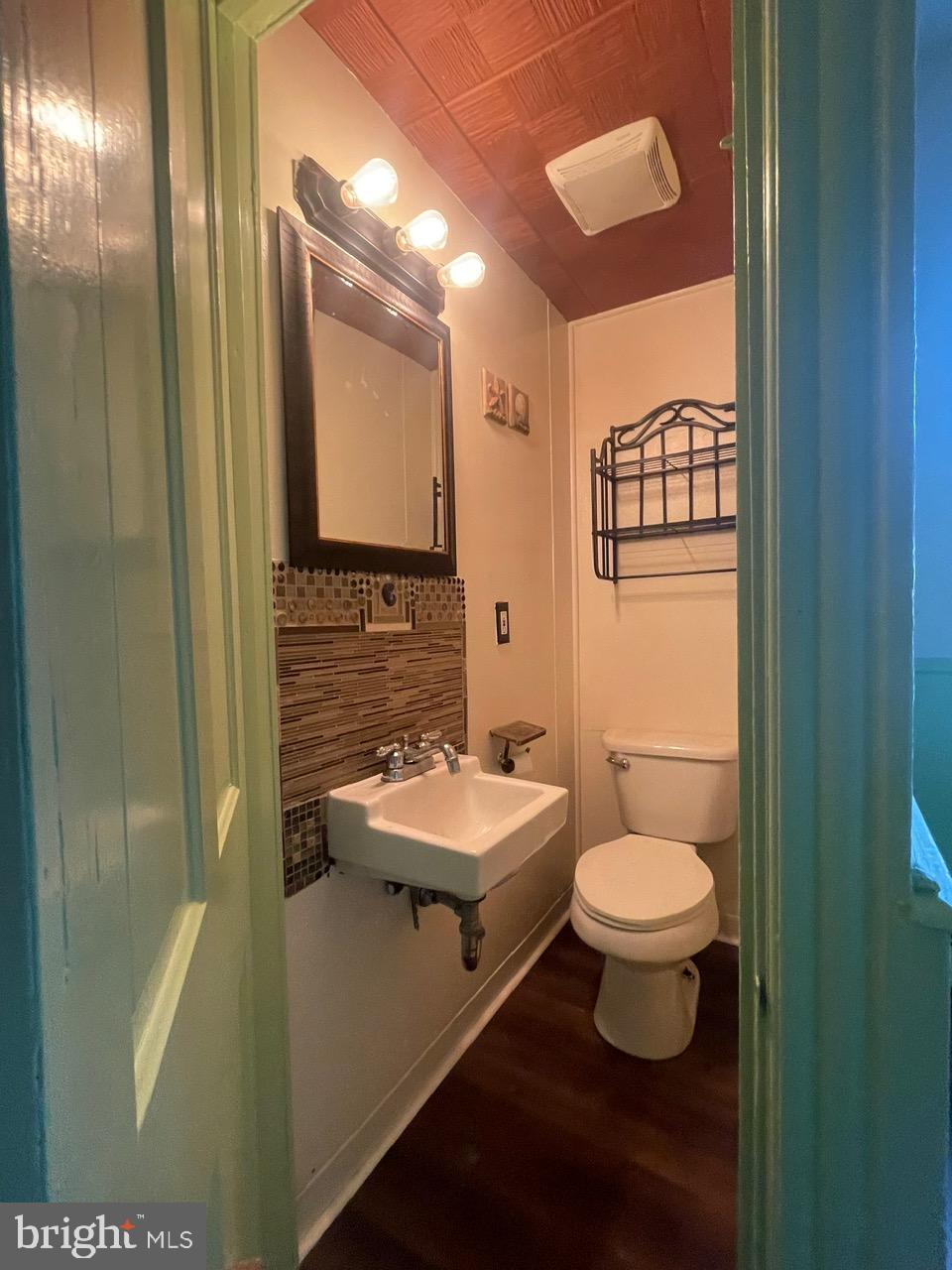 135 Lucknow Road Harrisburg, PA 17110 - Photo 14 of 37 a bathroom with a sink toilet a mirror and shower