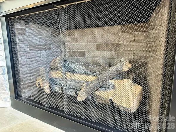 a view of a living room and kitchen view
