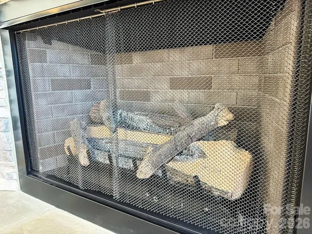 a view of a living room and kitchen view