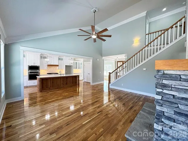 a view of kitchen with wooden floor
