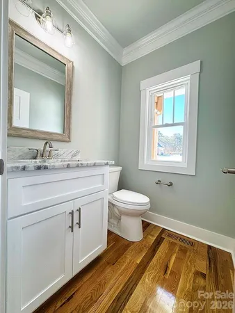 a deck view with wooden floor and fence next to a yard