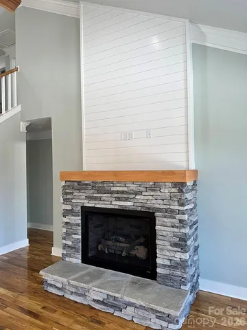 a living room with a fireplace