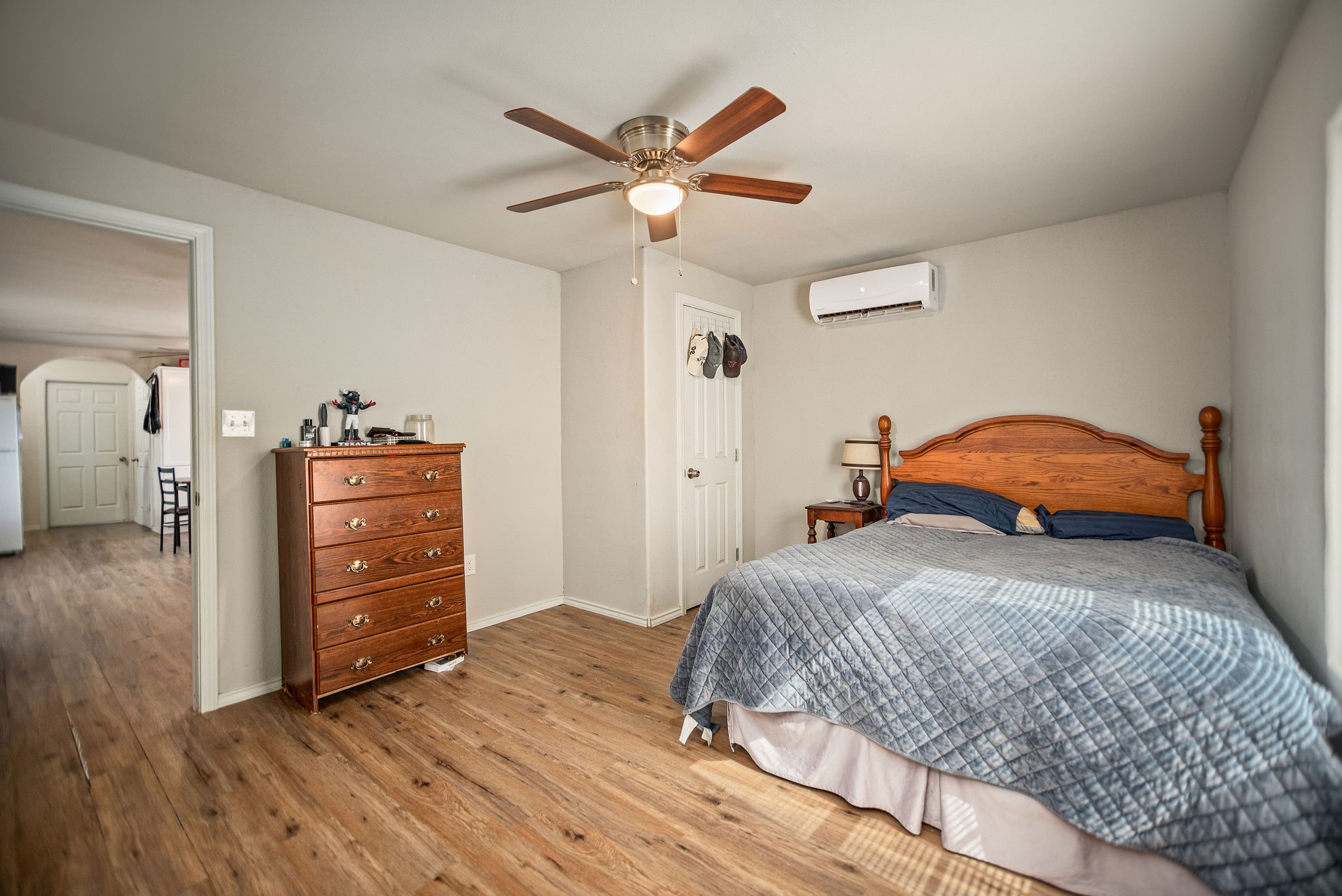 190 Hood Road Inez, TX 77968 - Photo 22 of 29 a bedroom with a bed and a dresser