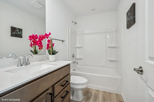 a view of an empty room with stairs