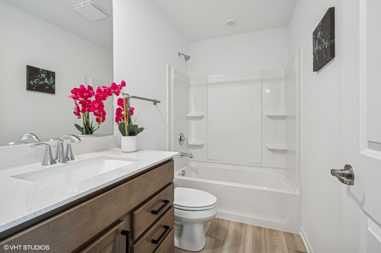 1204 Neubauer Circle, Unit 1304 Lindenhurst, IL 60046 - Photo 16 of 29 a bathroom with a sink vanity mirror and toilet