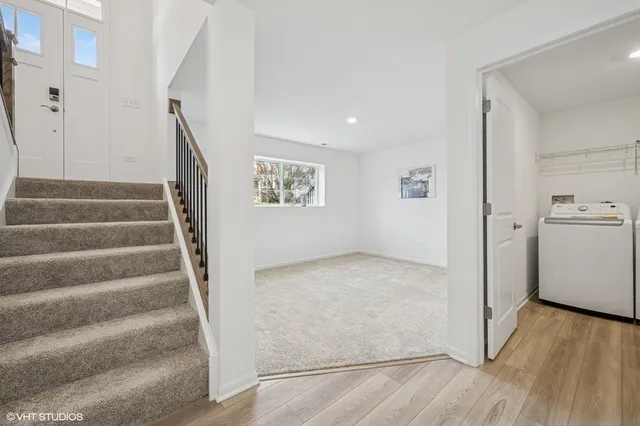 a picture of a bench in front of a wall