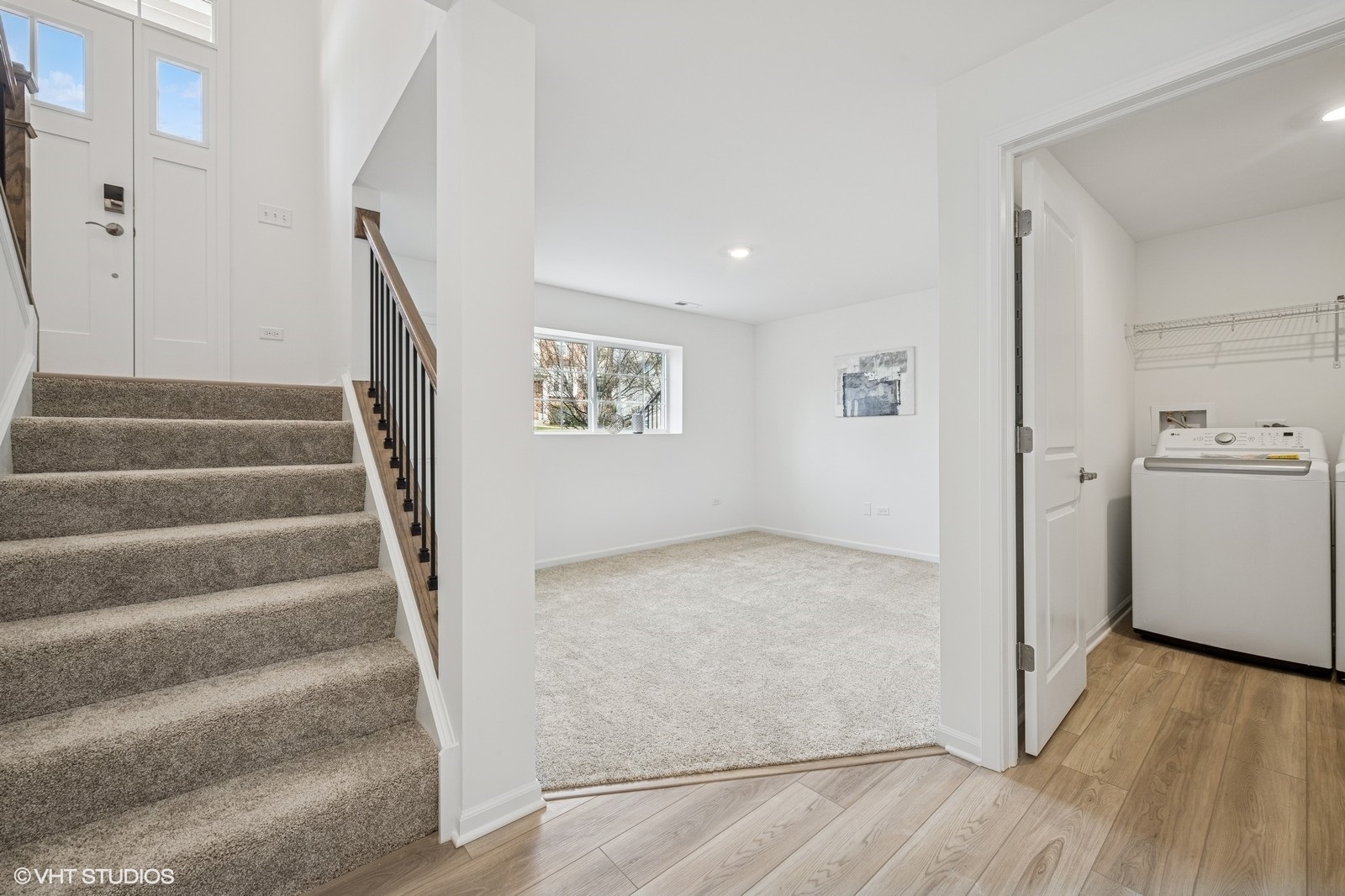 1204 Neubauer Circle, Unit 1304 Lindenhurst, IL 60046 - Photo 19 of 29 a view of entryway with wooden floor and stairs