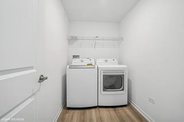 a picture of a bench in front of a wall