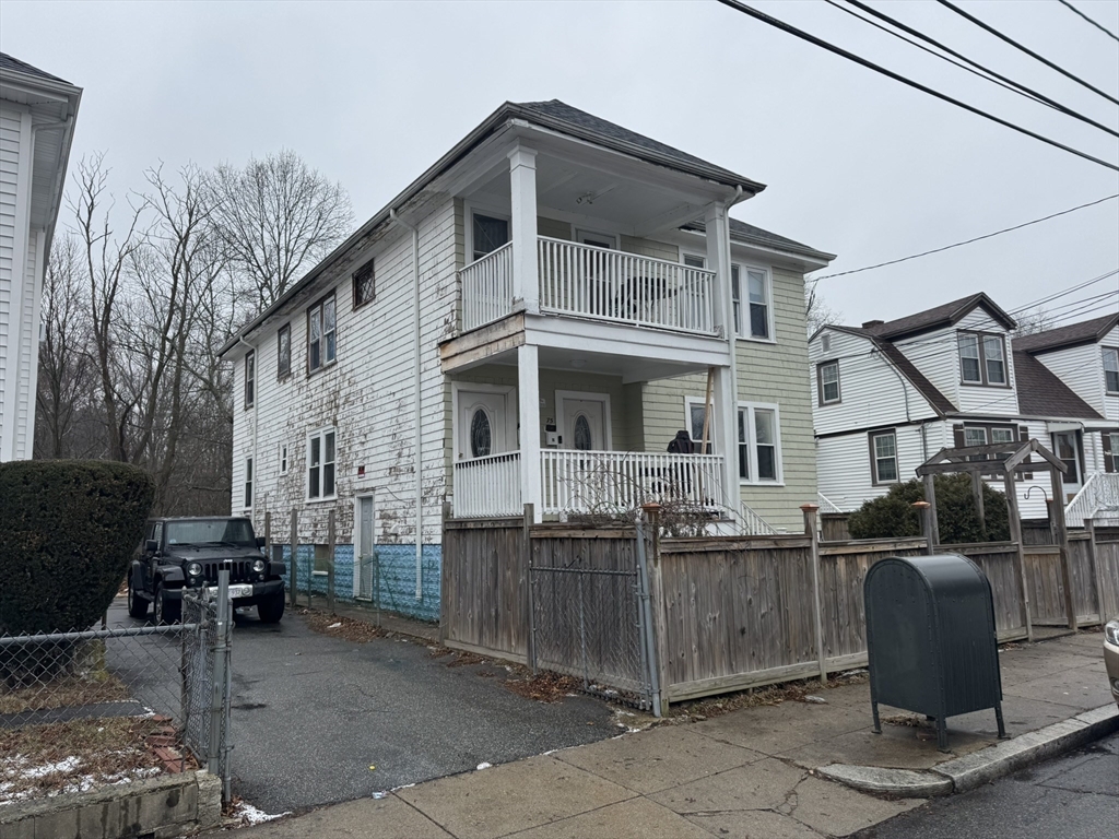 75-77 Belnel Road Boston, MA 02136 - Photo 3 of 23 a view of a house with backyard and sitting area