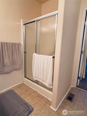 a view of a livingroom with furniture and a window