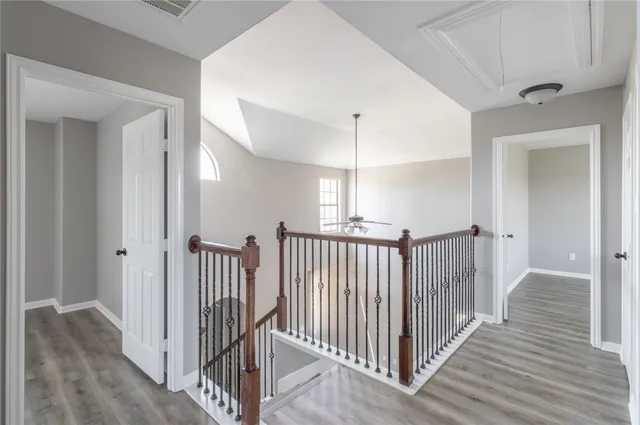 a bathroom with a shower and a sink