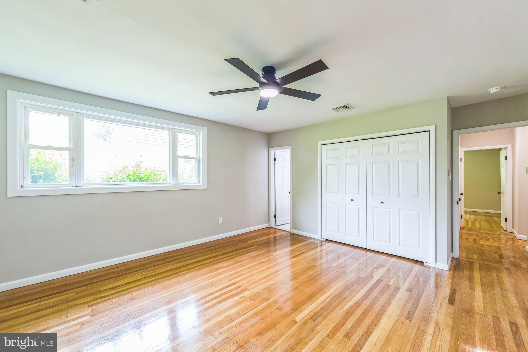 44 South Brookside Road Springfield, PA 19064 - Photo 19 of 30 a view of empty room with wooden floor and fan