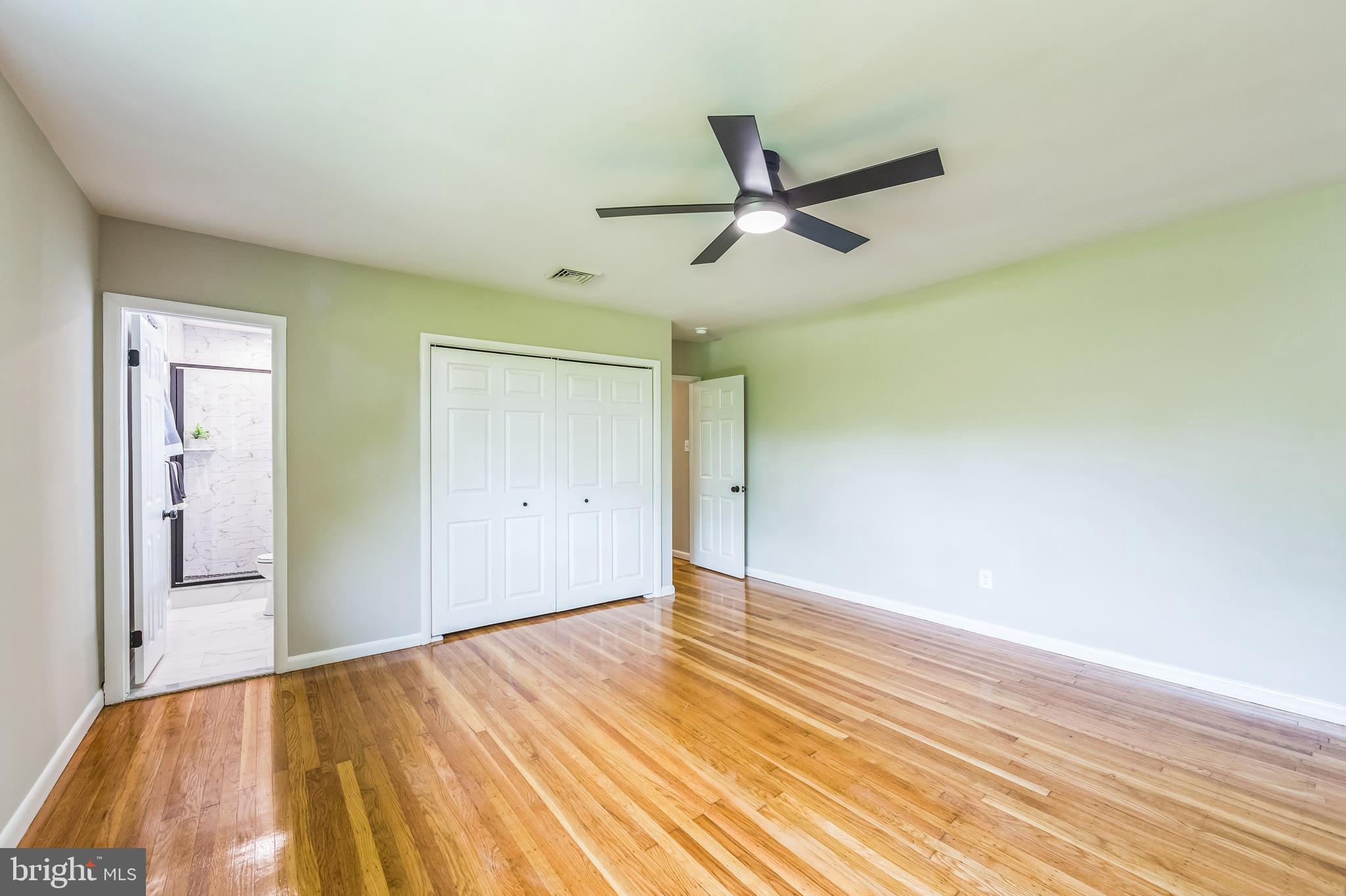 44 South Brookside Road Springfield, PA 19064 - Photo 20 of 30 a view of empty room with wooden floor and fan