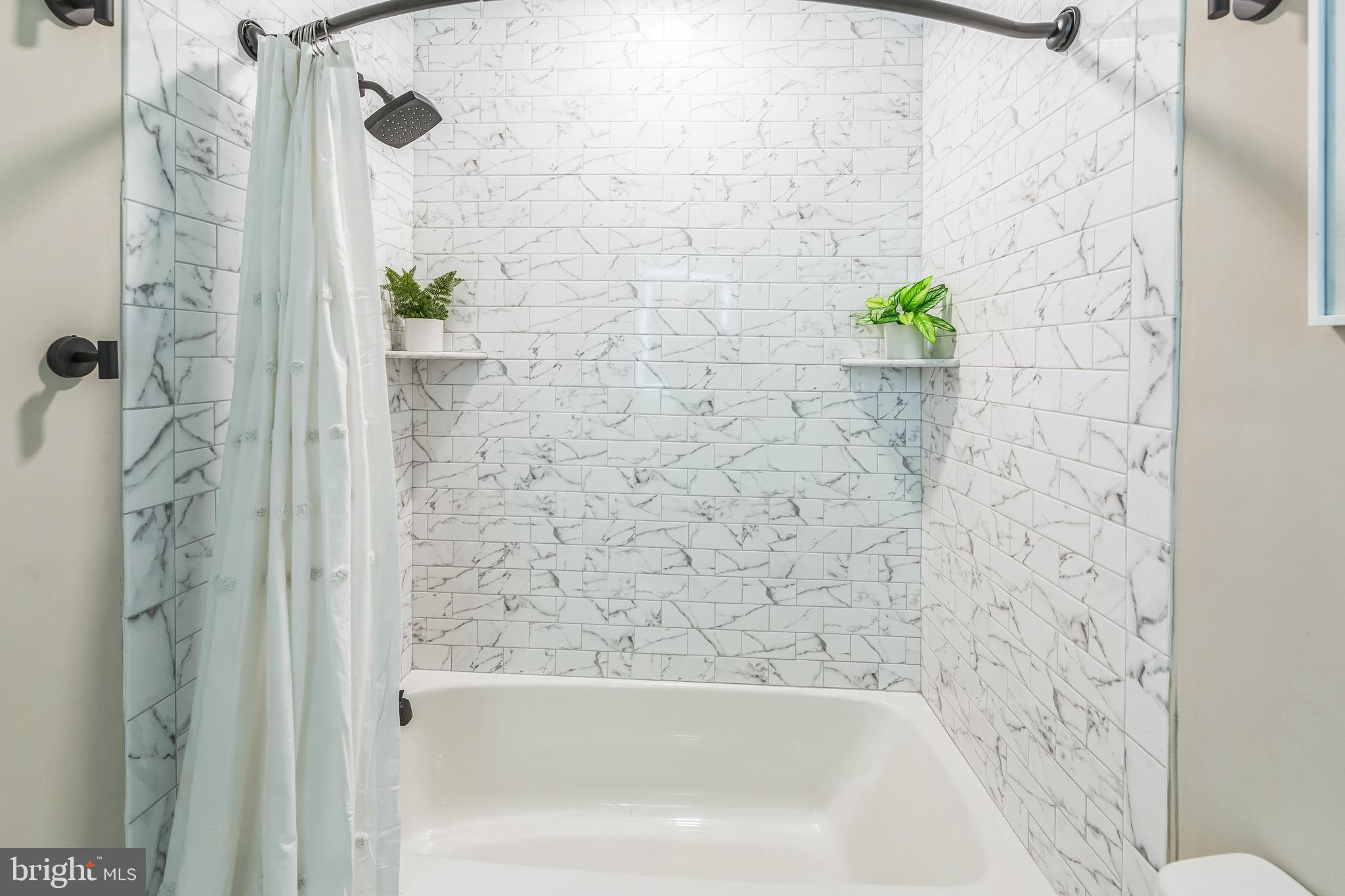 44 South Brookside Road Springfield, PA 19064 - Photo 25 of 30 a bathroom with a shower