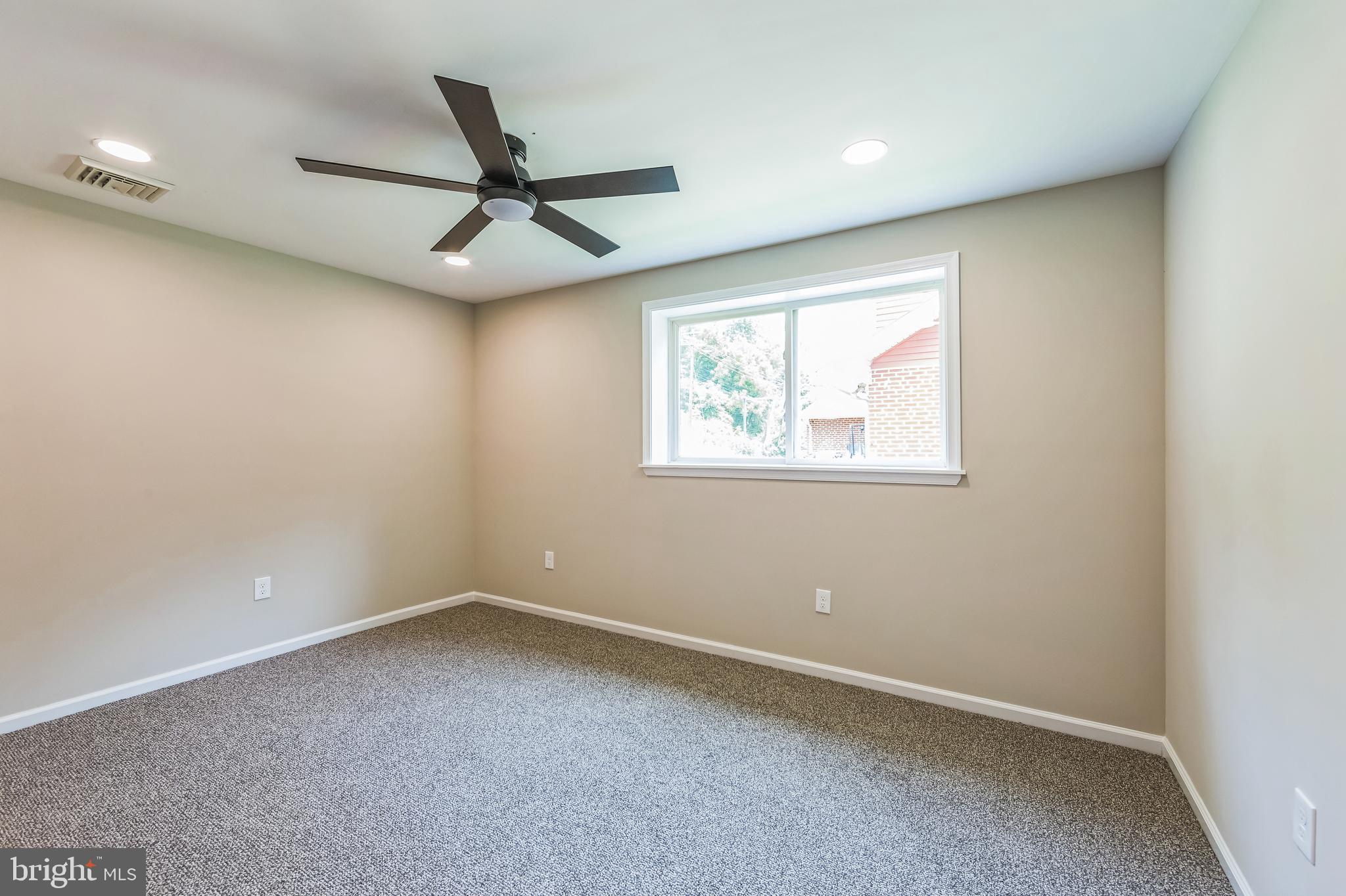 44 South Brookside Road Springfield, PA 19064 - Photo 27 of 30 an empty room with a window and a fan
