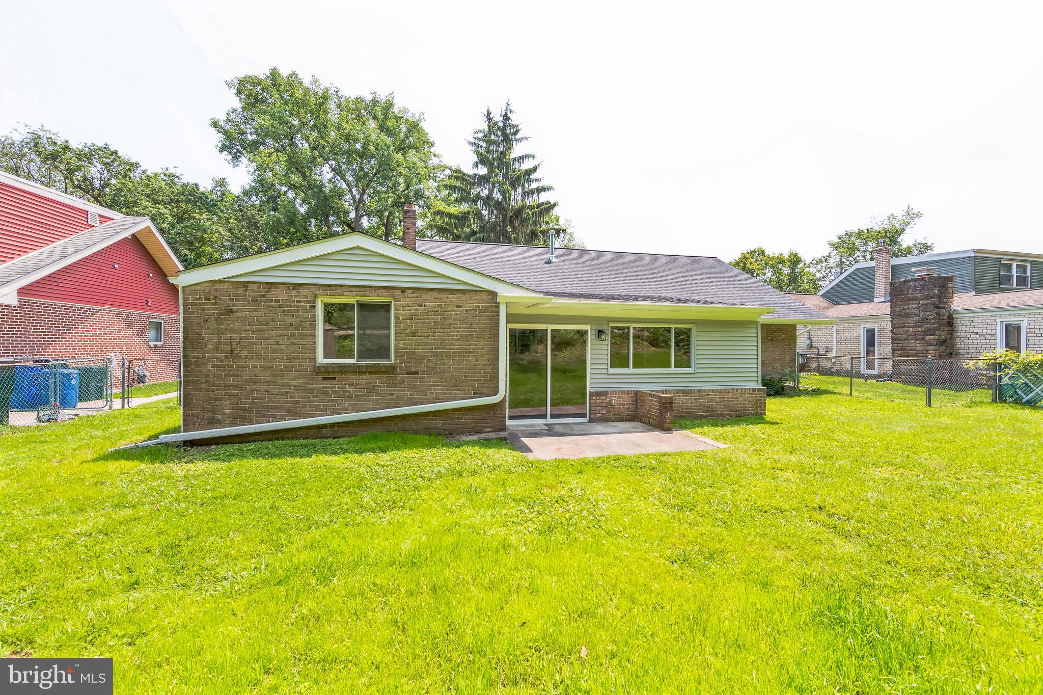 44 South Brookside Road Springfield, PA 19064 - Photo 30 of 30 a view of a house with a yard and sitting area