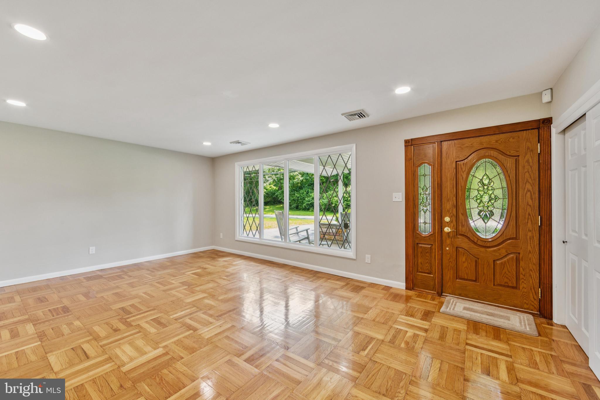 44 South Brookside Road Springfield, PA 19064 - Photo 5 of 30 a view of empty room with window and fan