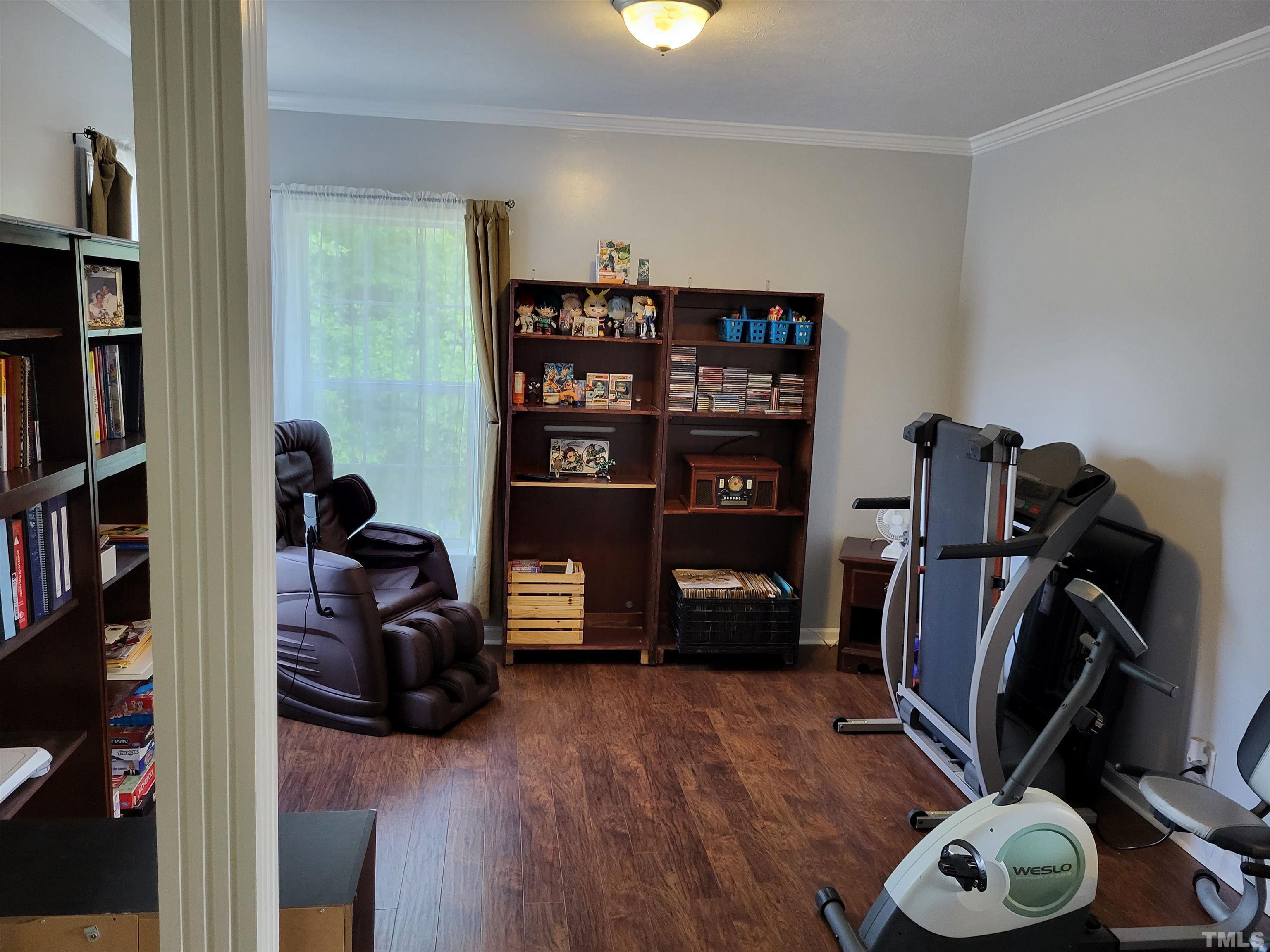 1096 Fire Lane Road Bunnlevel, NC 28323 - Photo 16 of 37 a view of a workspace with furniture and closet
