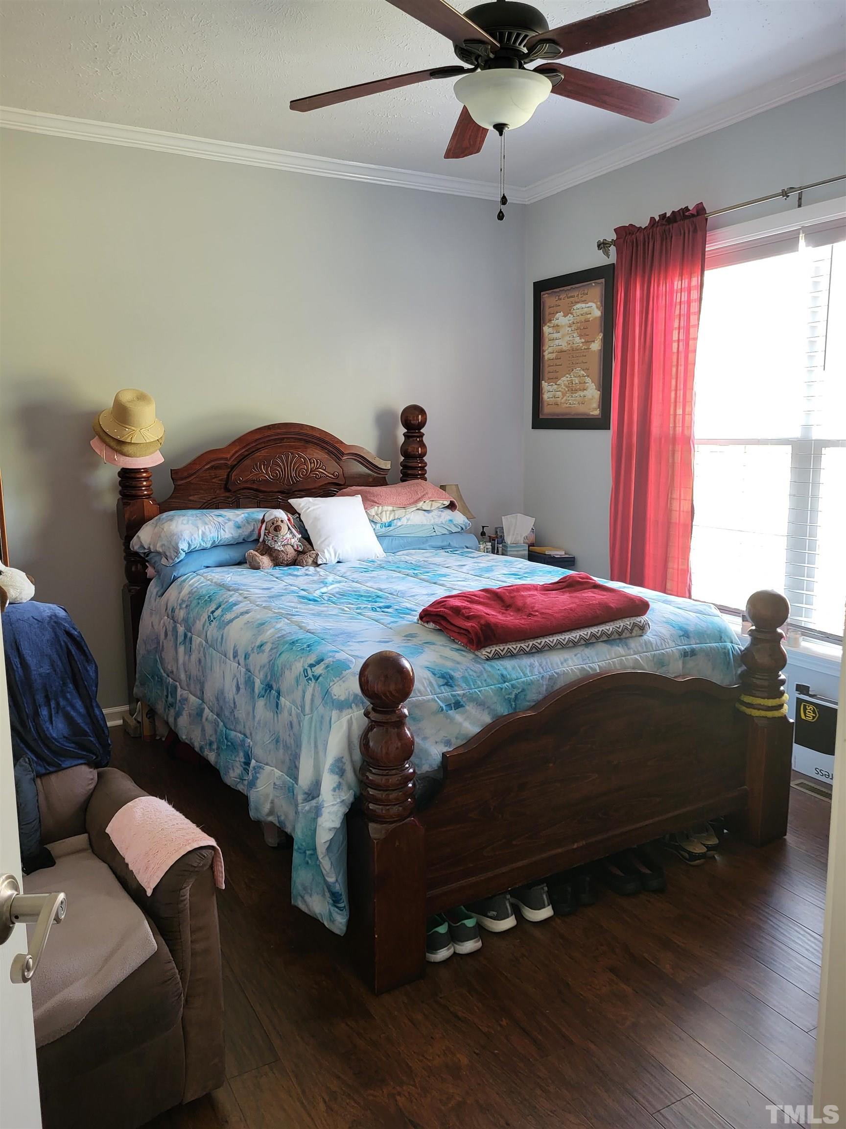 1096 Fire Lane Road Bunnlevel, NC 28323 - Photo 18 of 37 a bedroom with bed and window