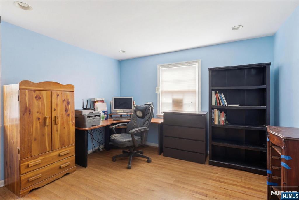 106 Summit Avenue Bloomfield, NJ 07003 - Photo 13 of 18 a view of a workspace with furniture and a window