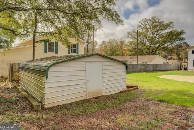 a view of a house with a ocean view