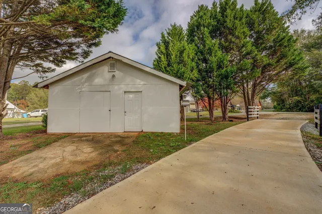 a view of a lake with houses in the back