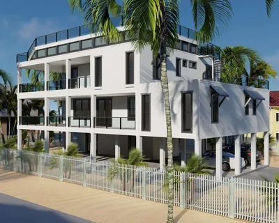 a front view of a building with a garden