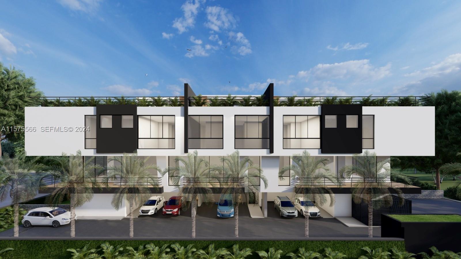 70 Northwest 53rd Street Miami, FL 33127 - Photo 1 of 7 an aerial view of a house with a yard and lake view