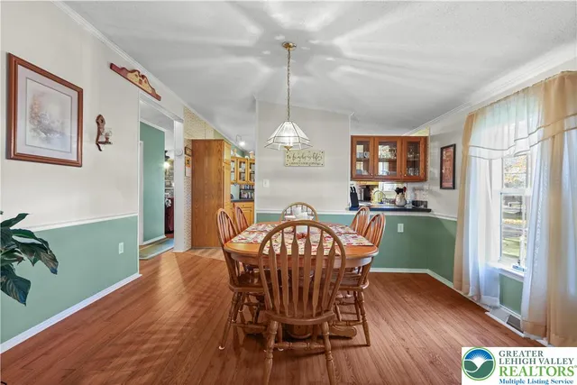 a living room with a fireplace furniture and a window