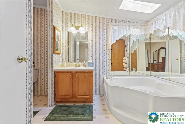 an aerial view of house with yard swimming pool and outdoor seating